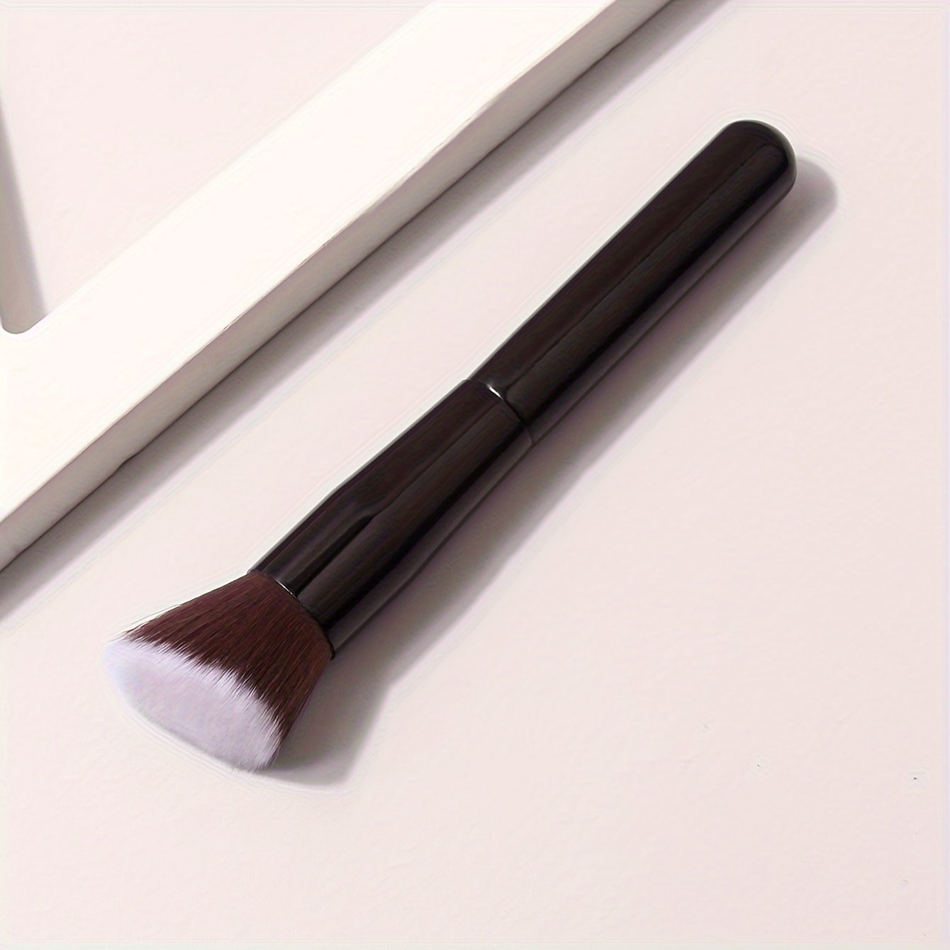 Multifunctional makeup brush with soft bristles